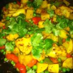 Cauliflower, Green Peas and Potatoes in Spicy Herb Sauce